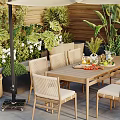 Outdoor Patio Dining Table And Chairs Set With Beige Umbrella And Green Plants