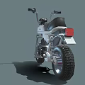 Classic Silver Motorcycle With Black Seat Round Headlight And Thick Tires