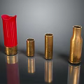 Weapon Bullet Casings in Golden and Red with Various Sizes on Reflective Surface