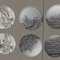 Wall Decor With Circular Plates In Various Colors And Textures On Gray Wall 3d model