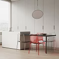 Modern Black Dining Table Set With Red Transparent Chairs Round Pendant Light And White Cabinets