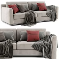 Light Gray Sofa With Red Gray Striped Pillows And Textured Blankets 3d model