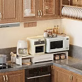 Modern Kitchen Appliances Including Toaster Oven Microwave On Organized Counter With Wooden Cabinets