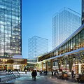 Modern Urban Commercial Street Scene With Glass Facades Pedestrians Trees Benches And Bright Atmosphere