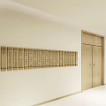 Elevator Hallway With White Walls Gray Floor And Mailboxes On Wall