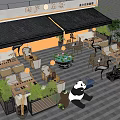 Commercial Street Outdoor Dining Space With Greenery Panda Crane Decor Cozy Seating And Ambient Lights