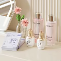 Cozy Bedroom Dressing Table Setup With Skincare Products Pink Flowers And Glass Vase
