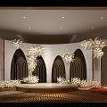 Luxurious Banquet Hall Decor With White Floral Arches And Carved Frames