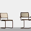 Modern Woven Chairs With Metal Frames Against Gray Wall And Neutral Floor