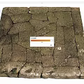 Natural Stone Paved Ground With Moss Covered Irregular Tiles Brownish Gray Textured Surface
