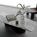 Modern Glass Coffee Table With Decorative Vase Plant And Book In Living Space