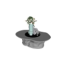 Elegant Metallic Coffee Table With Decorative White Vase Pink Flowers And Green Leaves