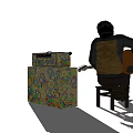 Man Sitting On Chair Playing Electric Guitar With Amplifier And Pedal