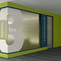 Modern Office Glass Partition With Success Tea Text And Green Wall Design