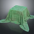 Green Cloth with Soft Texture Draped Over a Cube for Home Decoration 3d model