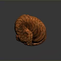 Curled Up Carved Orange Tiger Sculpture With Black Stripes And Fierce Expression
