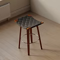 Dark Quilted Diamond Pattern Bar Stool With Wooden Legs Armrests And Silver Metal Footrest Ring