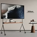 Modern Mikon TV on Rolling Stand with Books Decorative Items and Side Table
