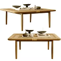 Minimalist Wooden Coffee Table With Tea Set And Decorative Items In Living Room