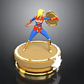 Female Superhero Figurine On Golden Base With Shield Sword And Star Decoration