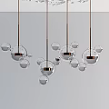 Elegant Modern Chandelier with Multiple Transparent Glass Spheres and Metallic Details