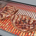 Juicy Grilled Steaks On Electric Grill With Red Heating Elements And Char Marks