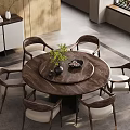 Modern Restaurant Interior With Round Wooden Dining Table Chairs Green Plant And Decorative Items