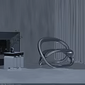 Modern Silver Leisure Chair With Curved Design In Minimalist Living Room Interior