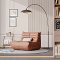 Modern Brown Single Sofa Living Space with Floor Lamp Round Rug Bookshelf and Wall Art