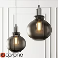 Two Modern Pendant Lights with Dark Glass Shades and Warm Illuminated Bulbs on White Wall