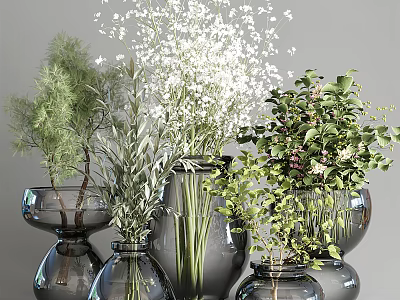 Decorative Glass Vases In Different Sizes Holding Various White Flowers And Fresh Greenery 3d model