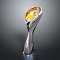 Shiny Trophy with Silver Base and Golden Leaf Shaped Top on Gray Background