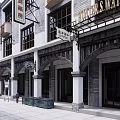 Traditional Commercial Street Featuring Vintage Shop Facades And Cobblestone Walkway