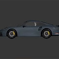 Blue Sports Car With Sleek Design Rear Spoiler Alloy Wheels And Shiny Exterior