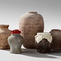 Handcrafted Ceramic Vessels With Rustic Textures And Decorative Accents On