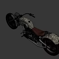 Camouflage Vintage Motorcycle With Classic Headlight Brown Seat Spoked Wheels And Chrome Exhaust Pipes