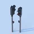 Black Traffic Lights With Red Signal On Poles Against Light Blue Background