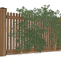 Wooden Garden Fence With Green Climbing Plants And Vertical Slats