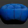 Modern Round Bean Bag Chair With Blue Puffed Sections And Comfortable Design