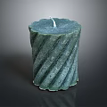 Green Twisted Pattern Candle With White Wick On Dark Background Reflection Surface