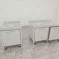White Mobile Cabinets With Drawers Countertops On Gray Floors And Marble Walls