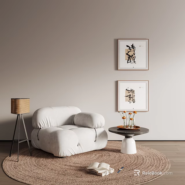 White Single Sofa With Beige Wall Two Framed Artworks Round Coffee Table Lamp And Rug 3d model 