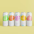Colorful Canned Fruit Drinks with Various Flavors and Fruit Patterns on Yellow Background
