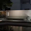 Modern Garden Landscape With Water Pond Lighting Trees And Rock Features
