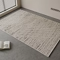 Beige Square Rug With Geometric Woven Texture On Grey Floor By Window And Open Book