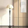 Elegant Floor Lamp With Scalloped White Lampshade And Decorative Metal Stand By Wooden Cabinet