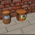 Two Wooden Barrels With Warning Labels Against Red Brick Wall On Stone Pavement