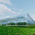Modern Glass Greenhouse Structure With Transparent Panels And Green Grass Surroundings