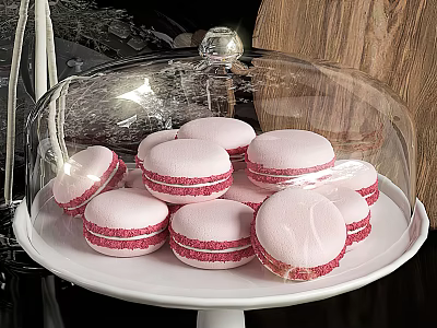Fresh Pink And White Striped Macarons Under Glass Dome On White Plate 3d model