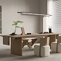 Modern Wooden Tea Table and Chairs with Tea Set and Green Plant in Minimalist Room